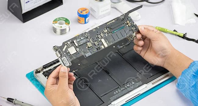 Disconnect flex cables and remove screws