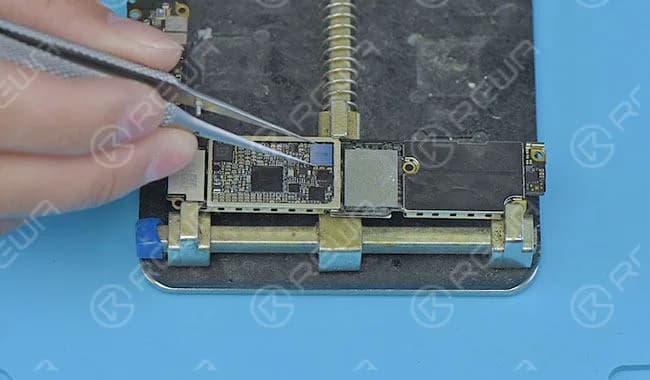 Apply some BGA paste flux to the bonding pad. Then align the audio IC to the right place and blow it with a hot air gun at 280 degrees.
