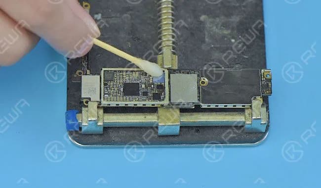Once the logic board is cooling enough, clean it with PCB cleaner.