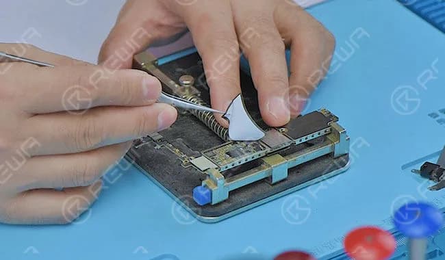 Take out the logic board and tear off the shield sticker.
