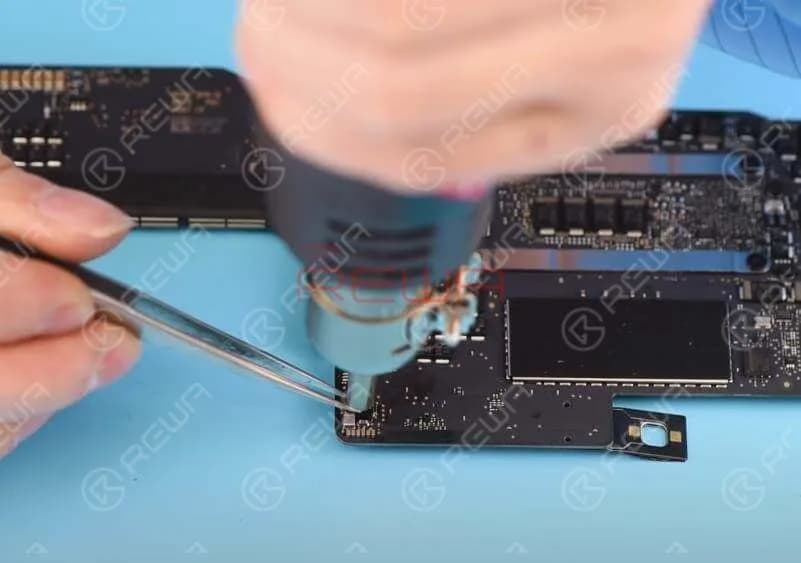 Apply some BGA Paste Flux and detach U6990 with Hot Air Gun at 430℃.