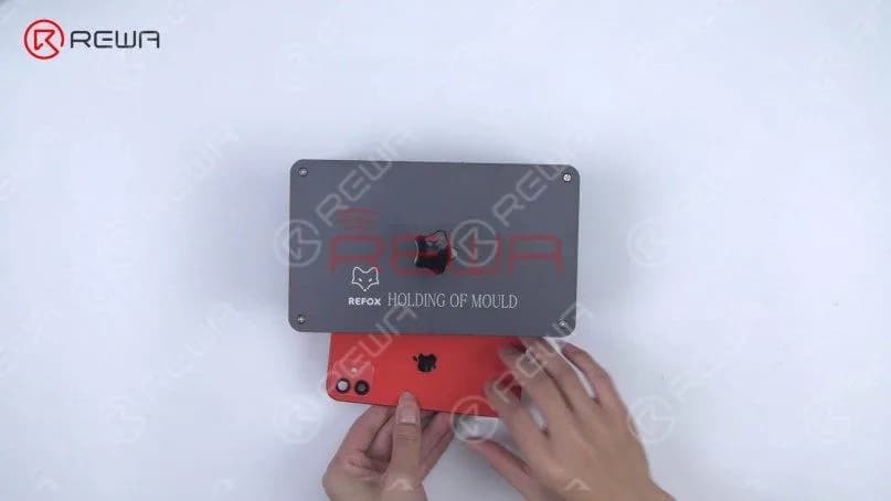 Press the back glass further against the middle frame with Press Clamp.