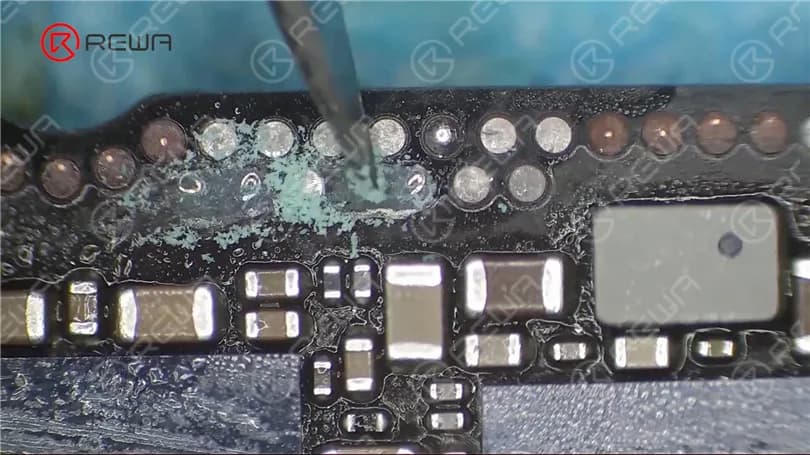 Scrape away excess solder mask with Sculpture Knife to show the copper wires.