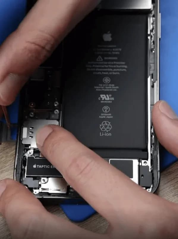 Remove the original iPhone 12 Pro battery carefully
