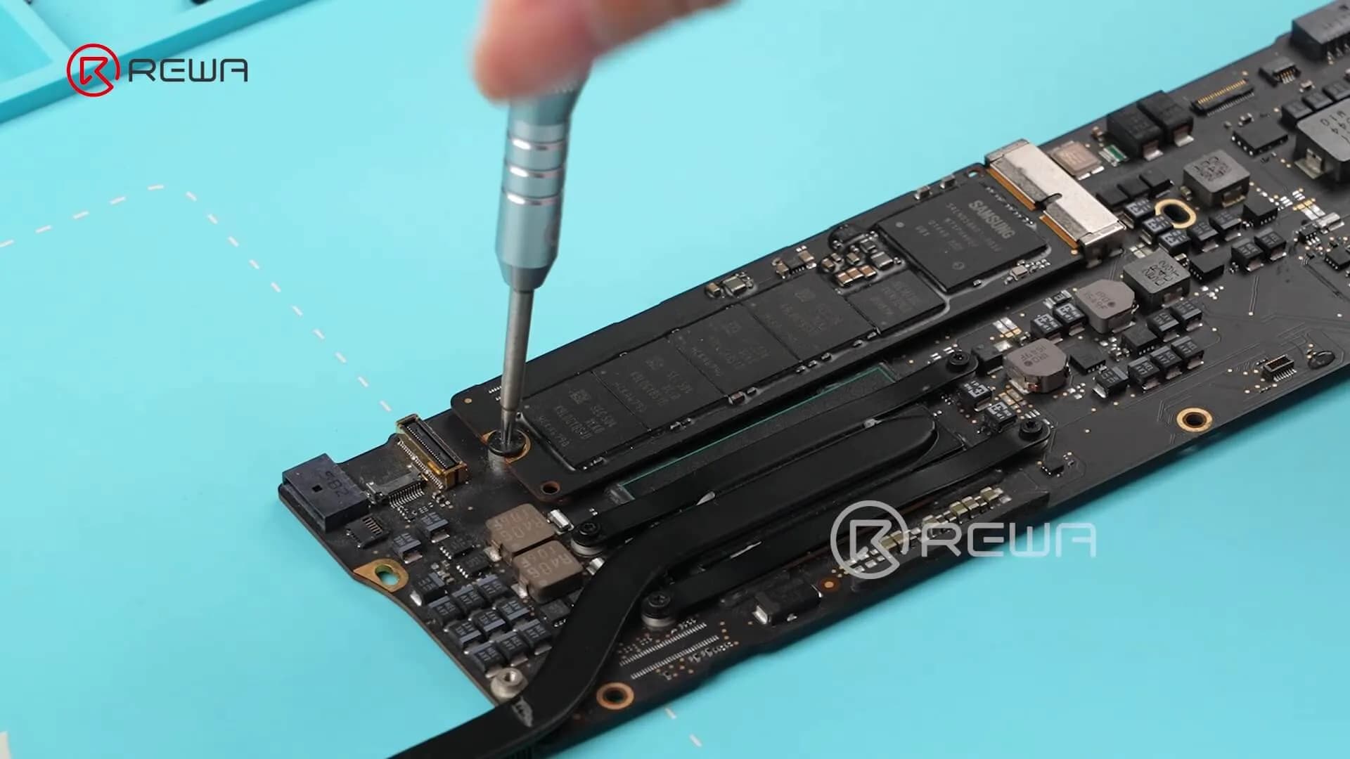 unscrew to remove macbook ssd