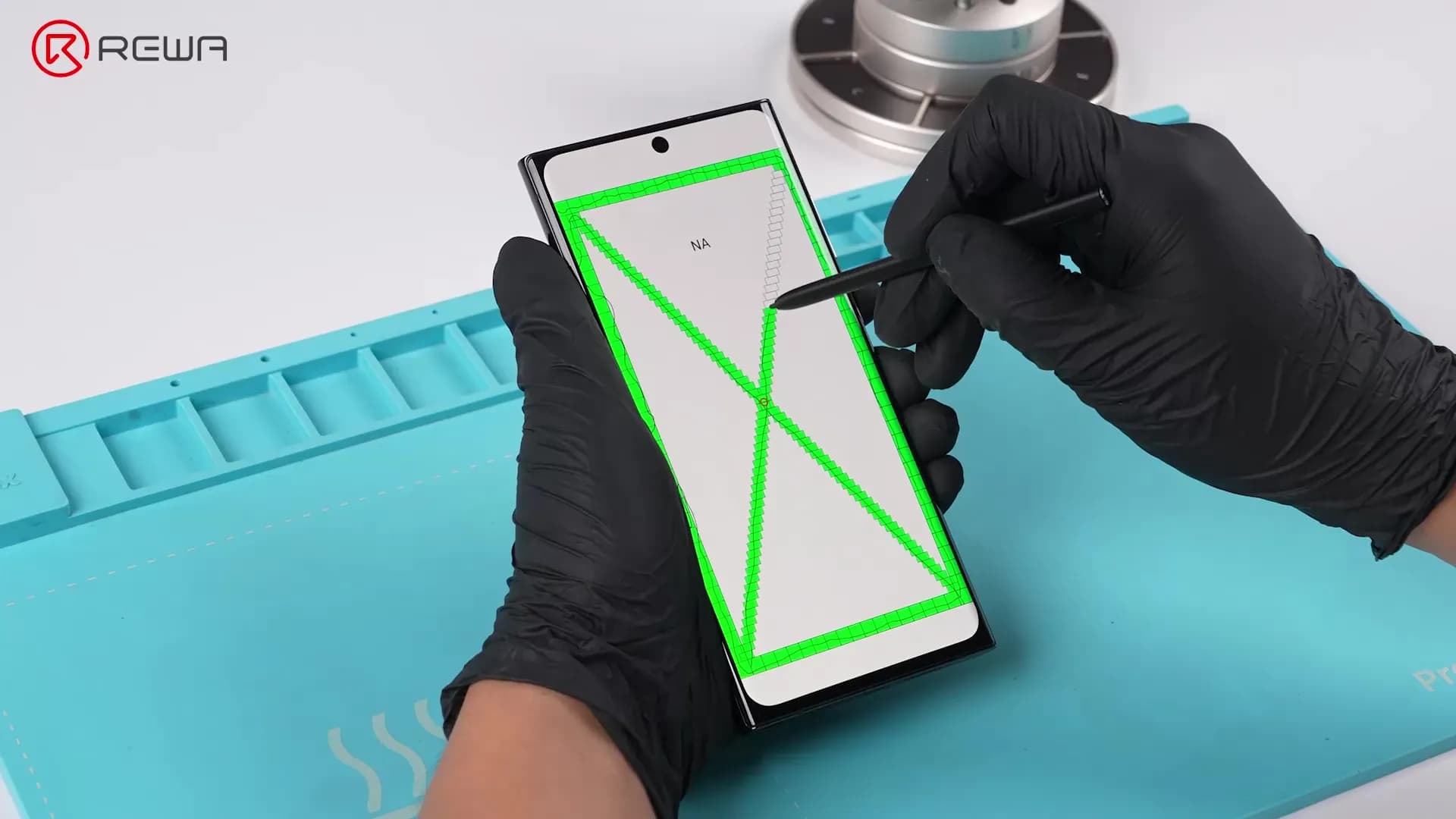Technician using an S Pen to perform a touch sensitivity test on a Samsung aftermarket OLED screen