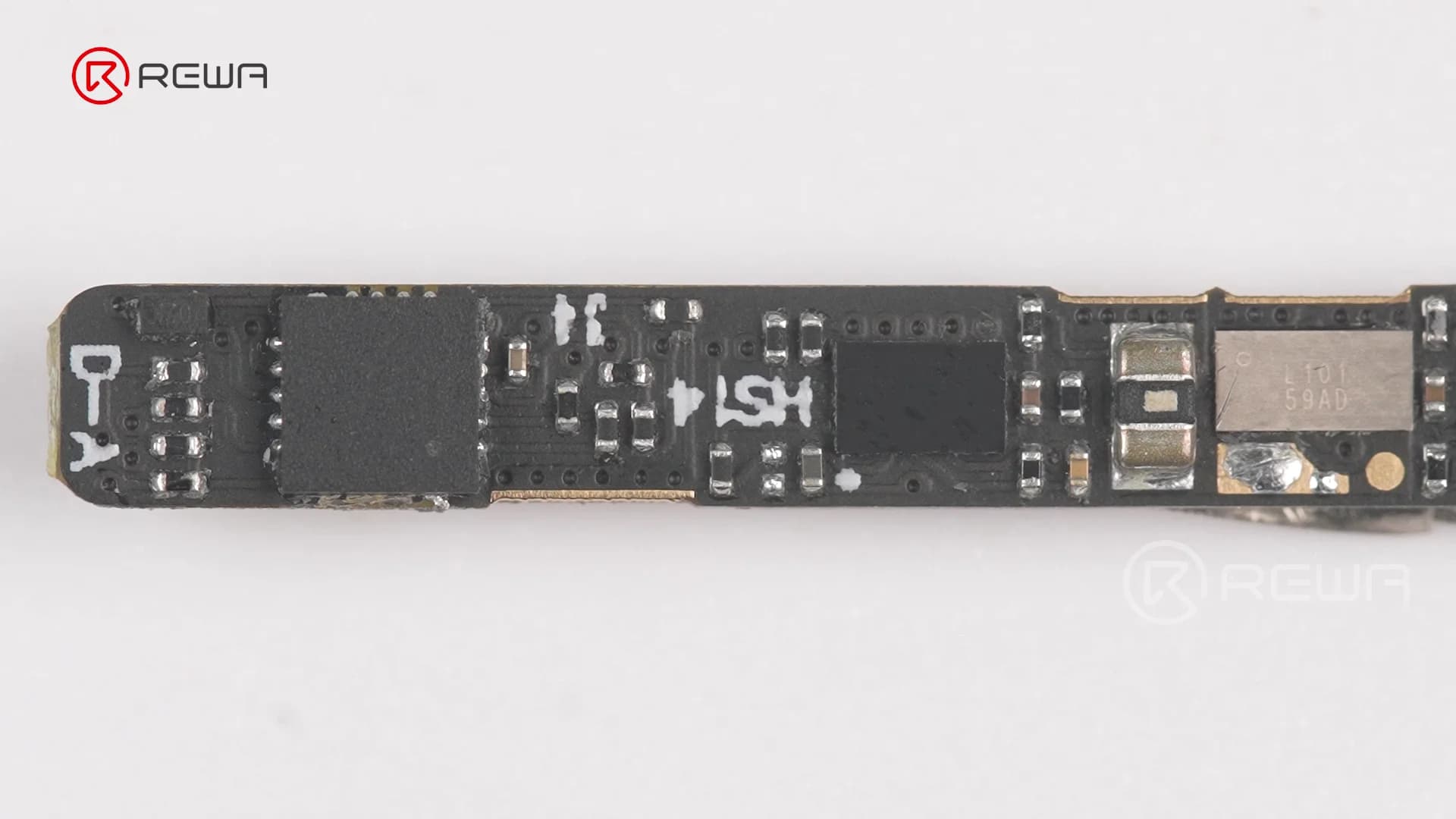 Close-up view of a populated black iPhone battery BMS circuit board with surface-mounted chips and electronic components
