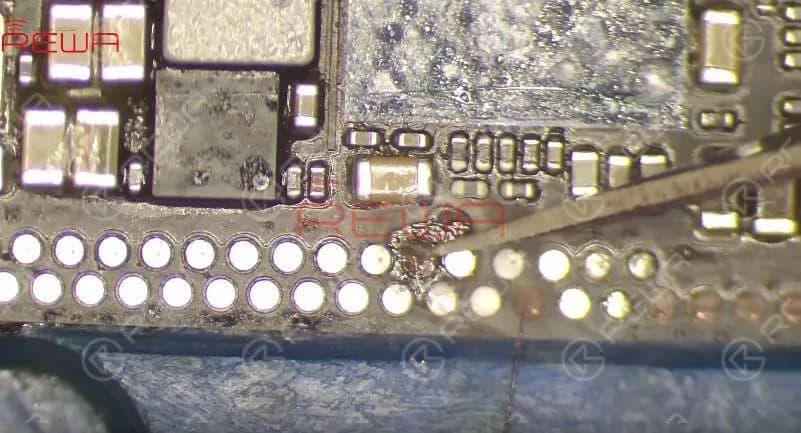 Since most of those missing pads are ground pads, we can just ignore them. Still, we need to treat Pin S166 with jumper wiring before soldering. Once done, get the lower layer reballed and re-solder the motherboard.