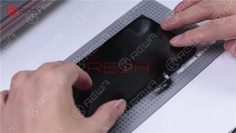 Since the iPhone 12 aligning mold has not come out yet, we use manual alignment. After alignment, place the screen on the laminating sponge. Please notice that two slots are cut on the sponge in order to prevent OLED damage.