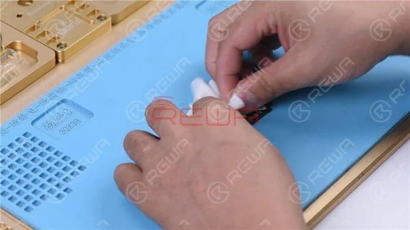 Remove the thermal grease on the logic board.
